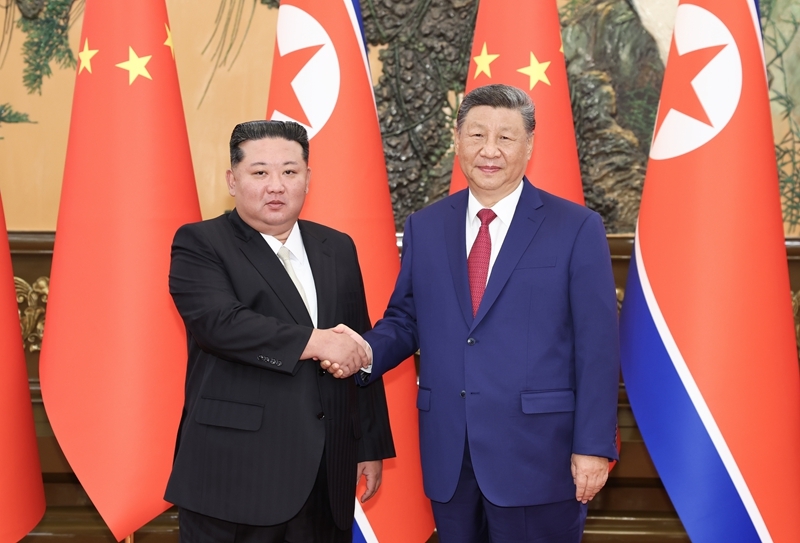 习近平同朝鲜劳动党总书记、国务委员长金正恩举行会谈